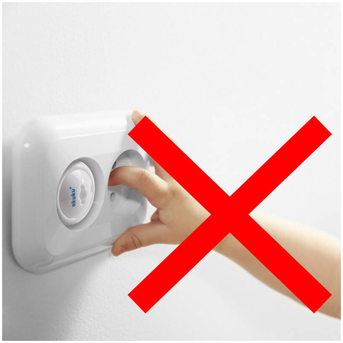 Little child’s hand playing with power socket, closeup