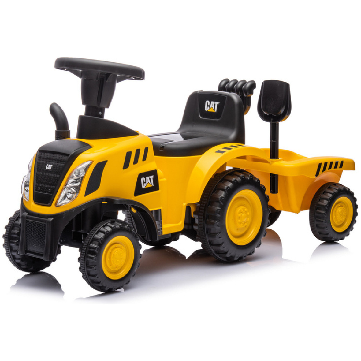 Jalgadega lükatav traktor CAT haagisega kollane